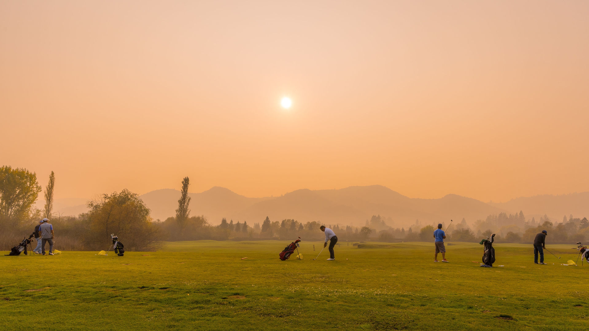 Golfers in smoke in Napa Valley November 2018